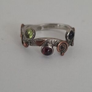 Silver Multi-Stone Ring with Red, Green, and Black Accents